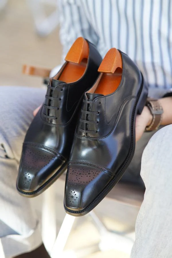 Classic Black Wingtip Oxfords